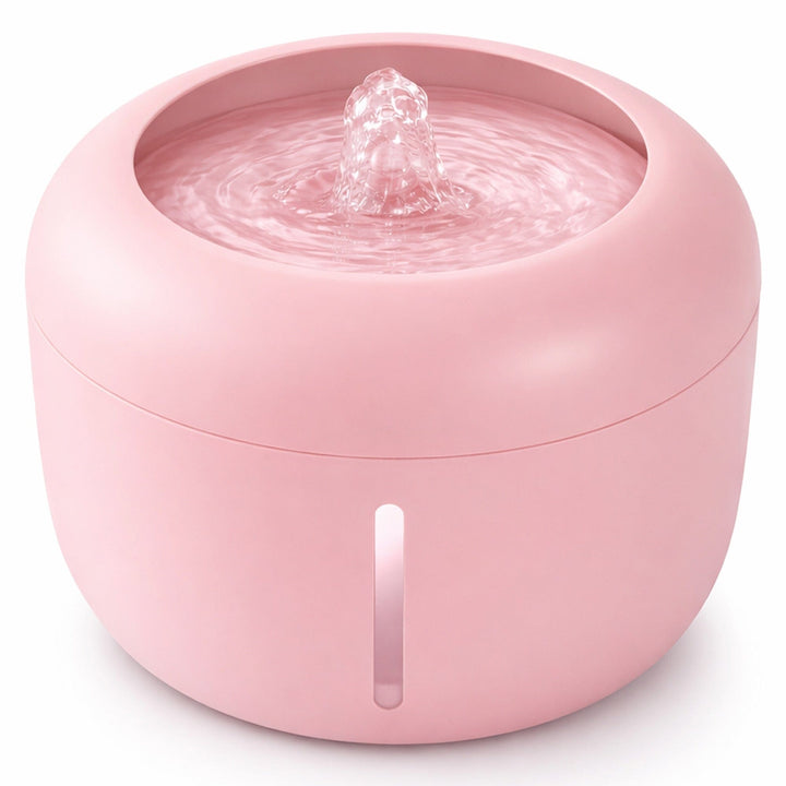 Pink, round filtered cat fountain with a bubbling water spout and a vertical water-level window on the front, shown on a white background.